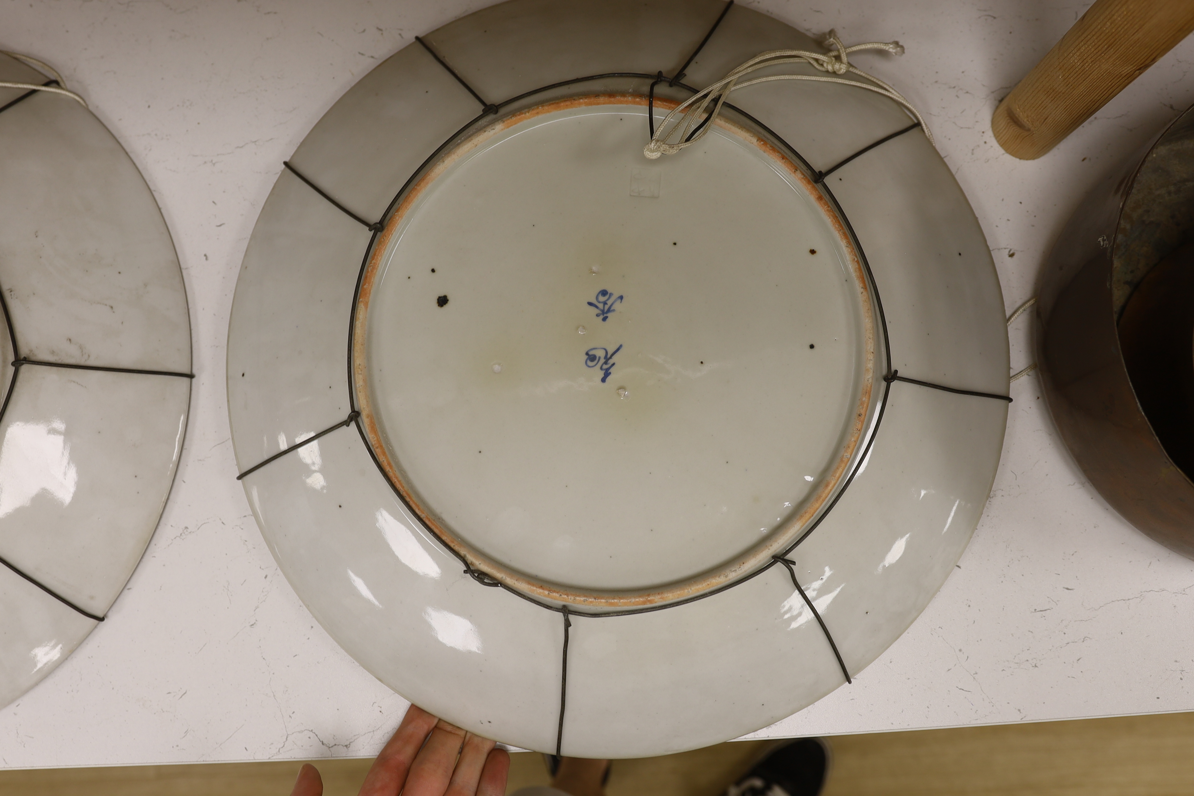 A pair of early 20th century Japanese porcelain chargers, 46cm diameter
